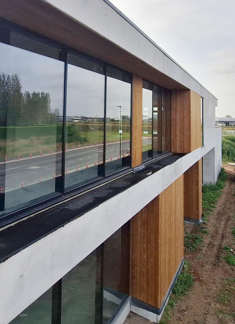 Gevelbekleding voor retailproject te Maldegem