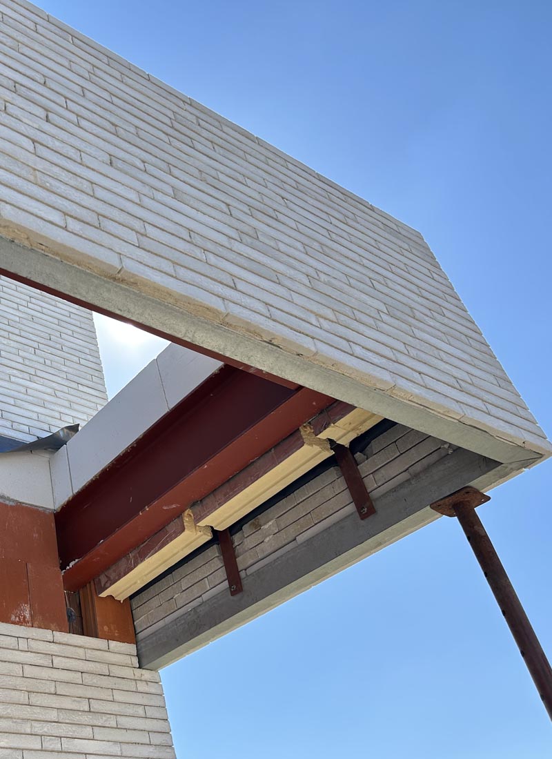 Luifel met houten roostering in Appelterre